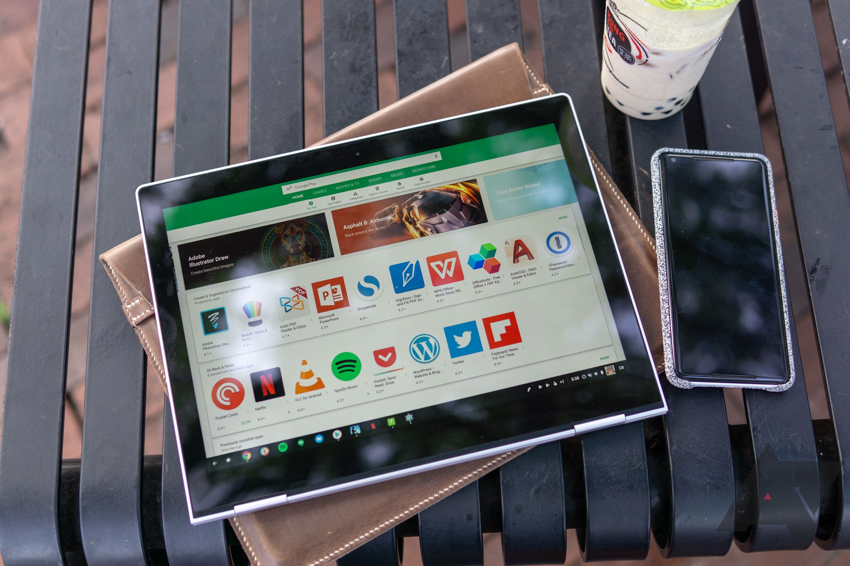 Pixelbook with the Play Store open in tablet mode with phone