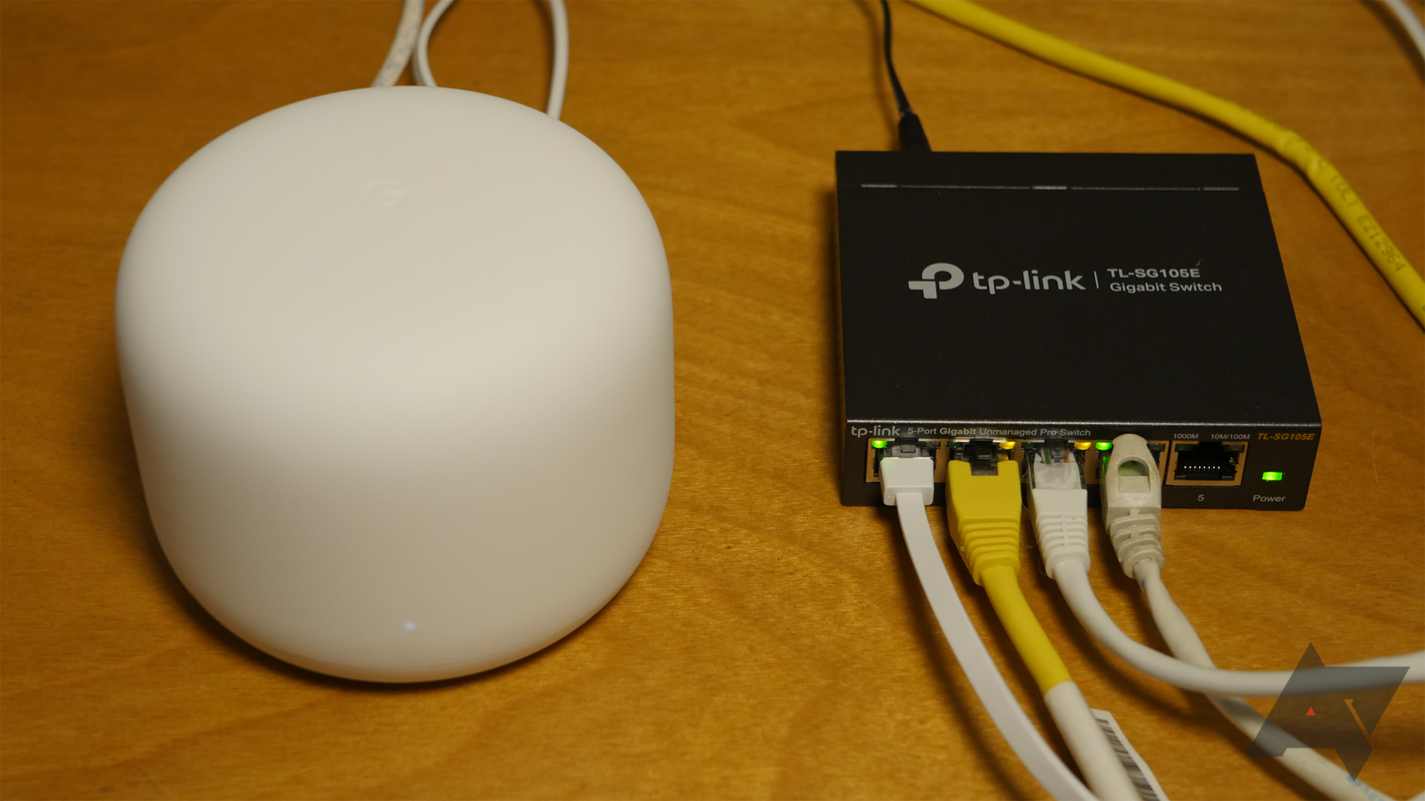 The Google Nest Wifi router connected to a network switch to gain more Ethernet ports.