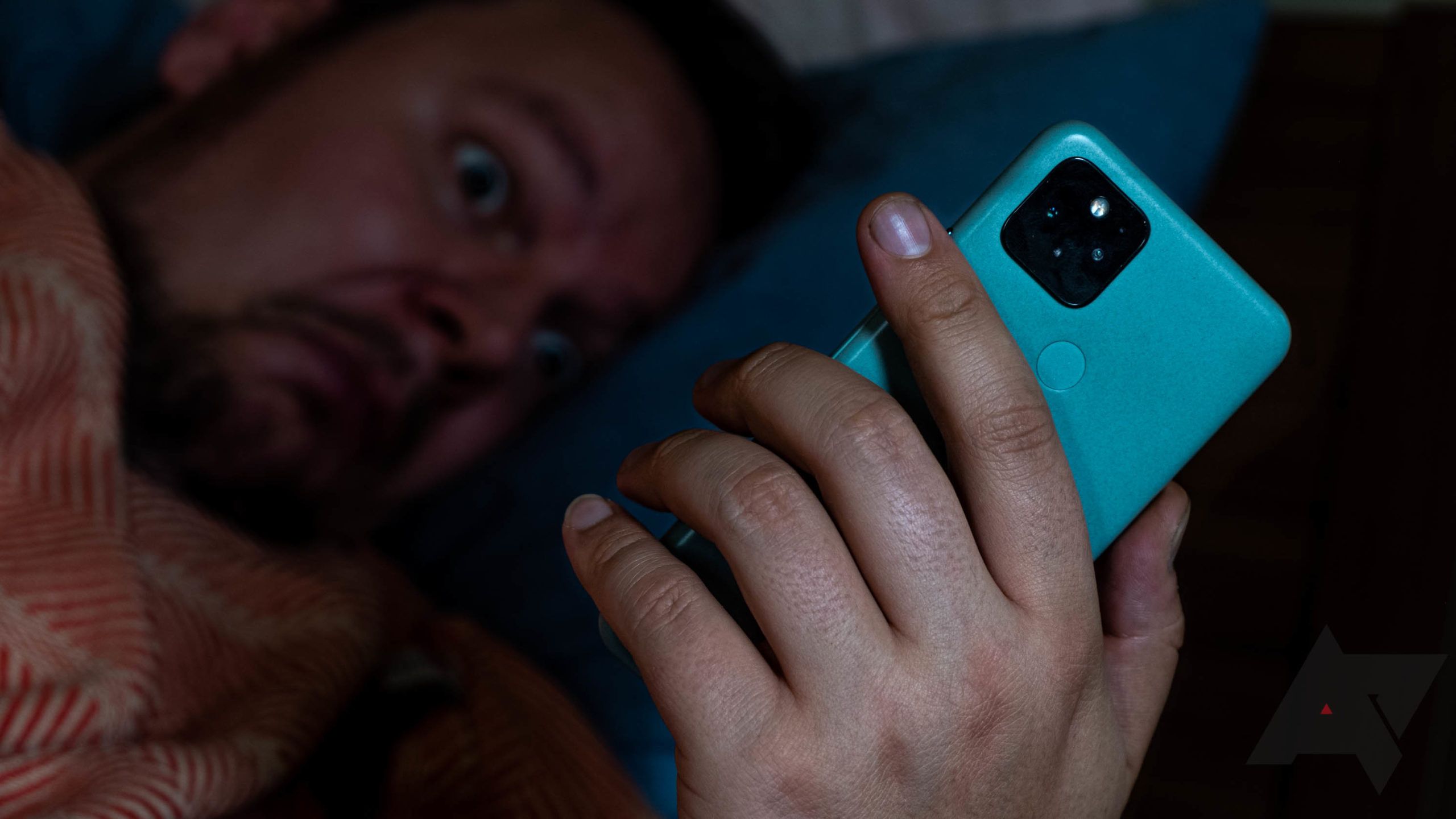 Person scrolling on their phone