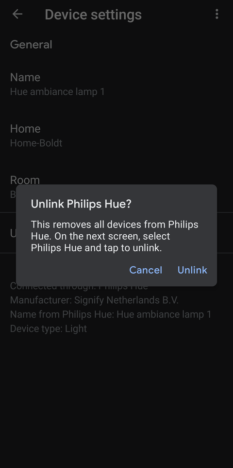 Screenshot shows the unlink option in the device settings page for a specific light in the Google home app. A pop-up says 'Unlink Phillips Hue?' with options to 'unlink' or 'cancel'.