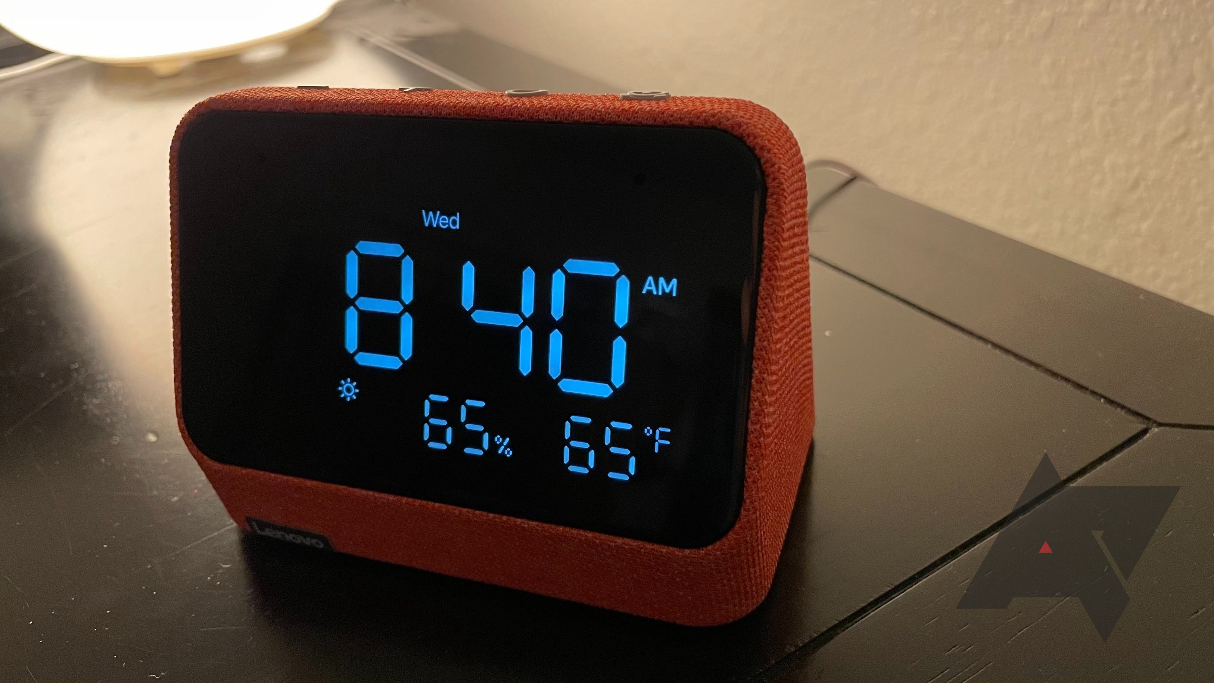 Lenovo Smart Clock Essential (with Alexa) on a nightstand