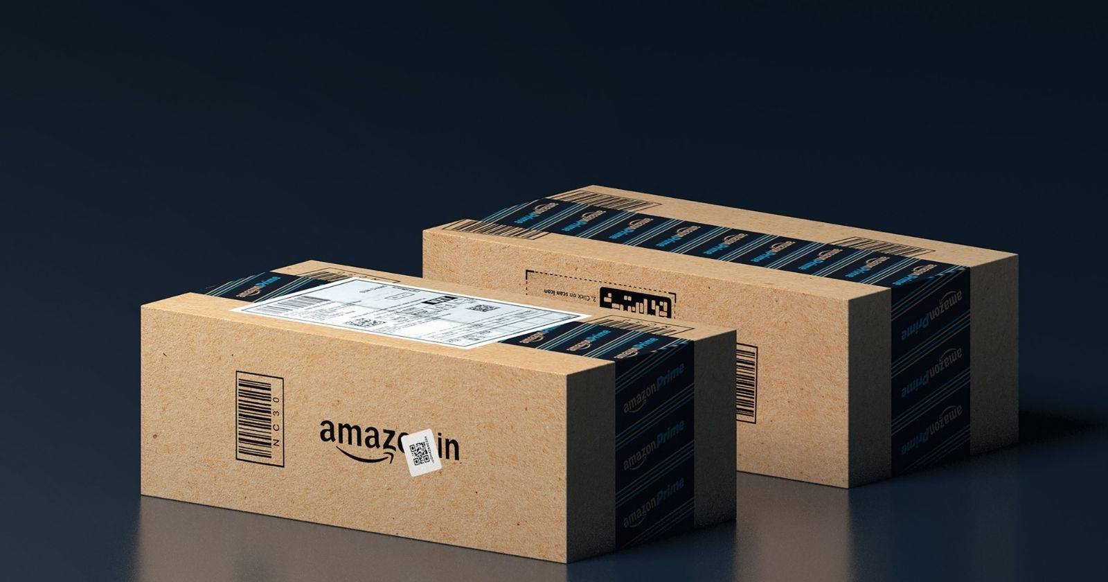 Two Amazon shipping boxes against a dark background