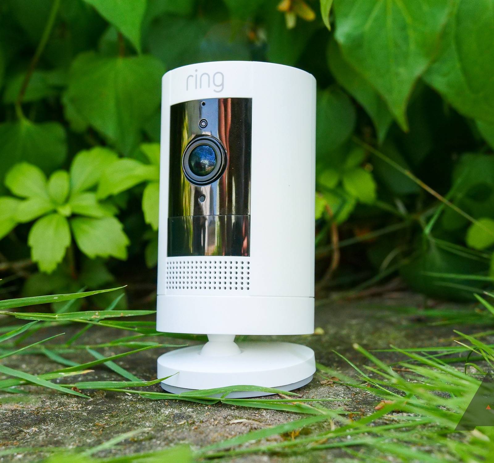 A detailed close-up of the Ring Stick Up Cam Battery, showing its lens and motion sensor, emphasizing its sleek and functional design.