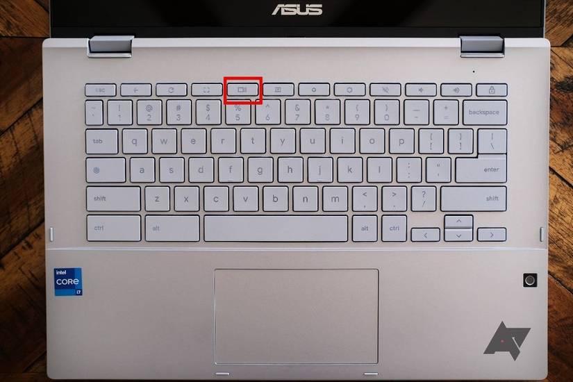 A Chromebook keyboard with the Show Window button highlight