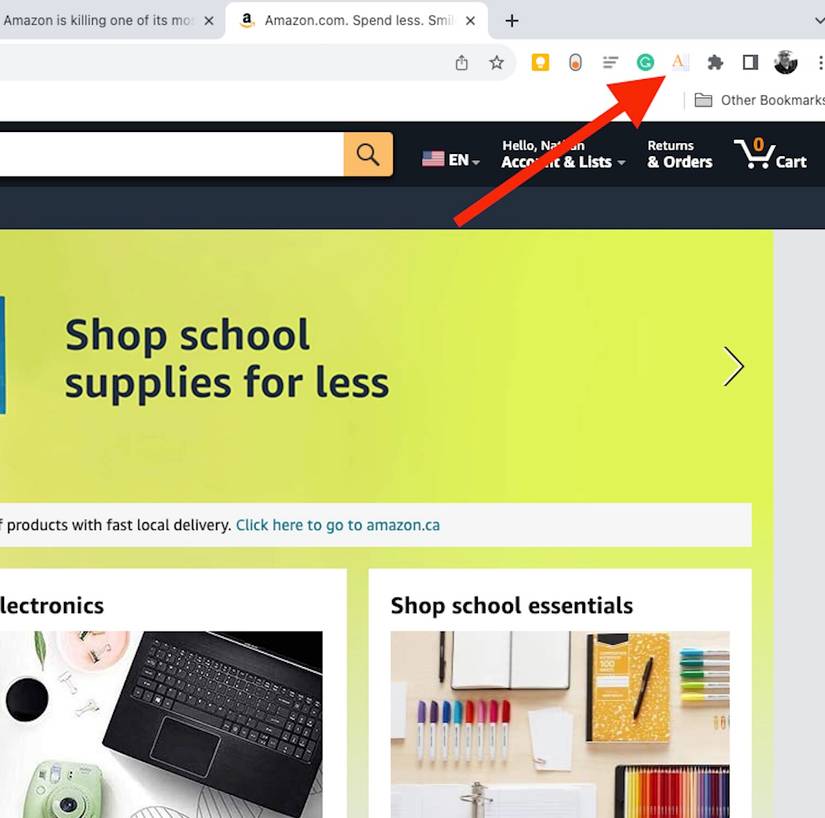 Amazon homepage in Chrome with a red arrow pointing to the Amazon Order History Reporter extension in the top right