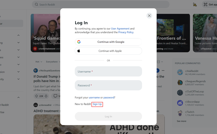 The Sign Up link highlighted on the Reddit login prompt