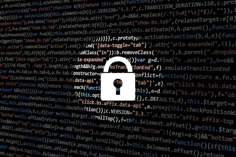 A white lock against the background of lines of code
