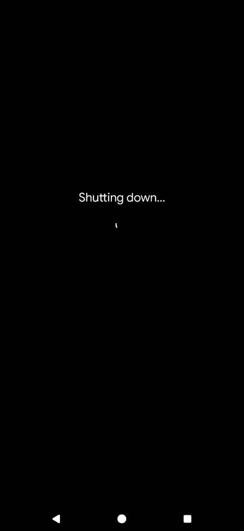 A black screen with the "Shutting down.." text on a Google Pixel phone