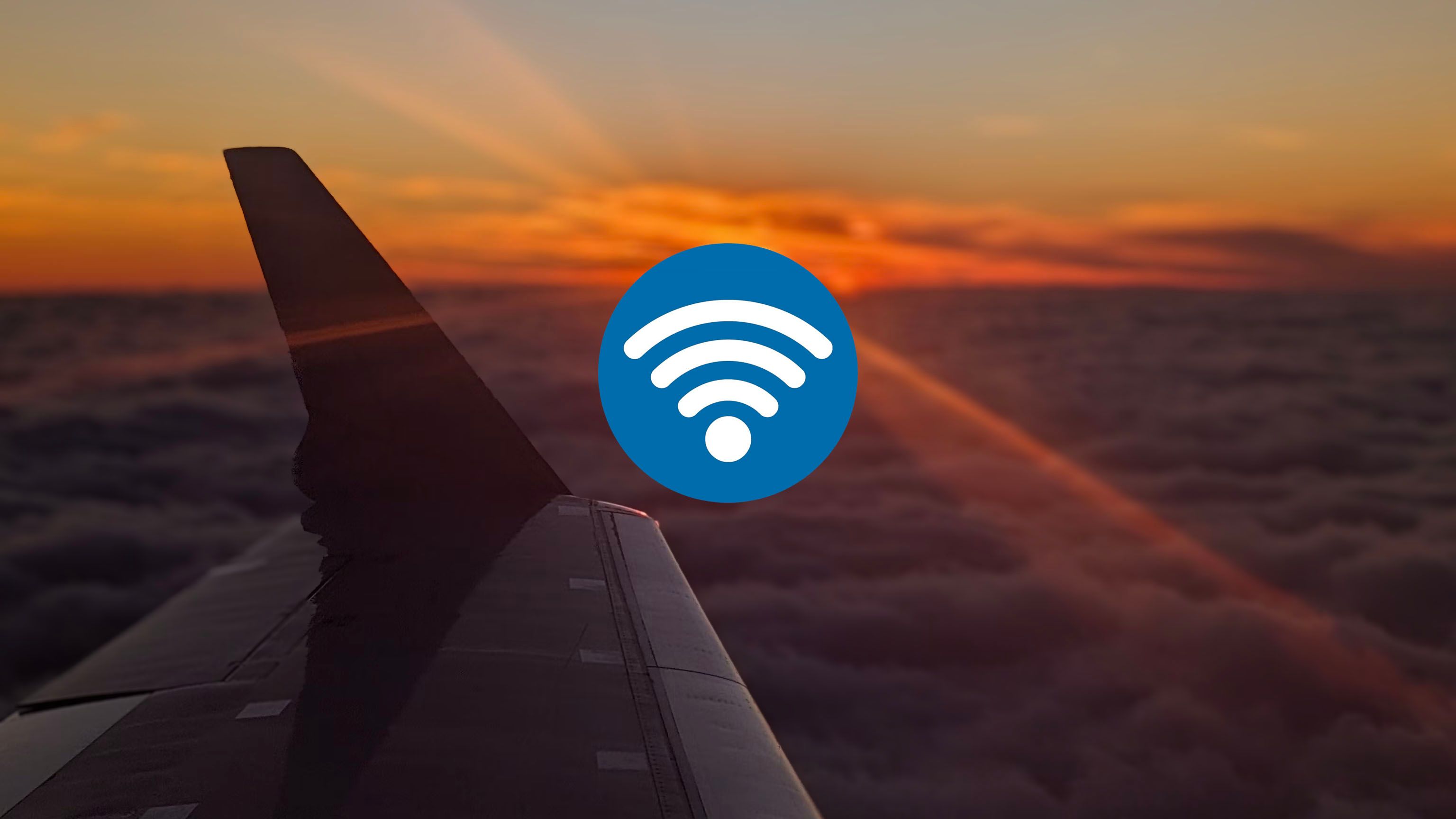 Logo Wi-Fi e foto di un tramonto visto da un aereo