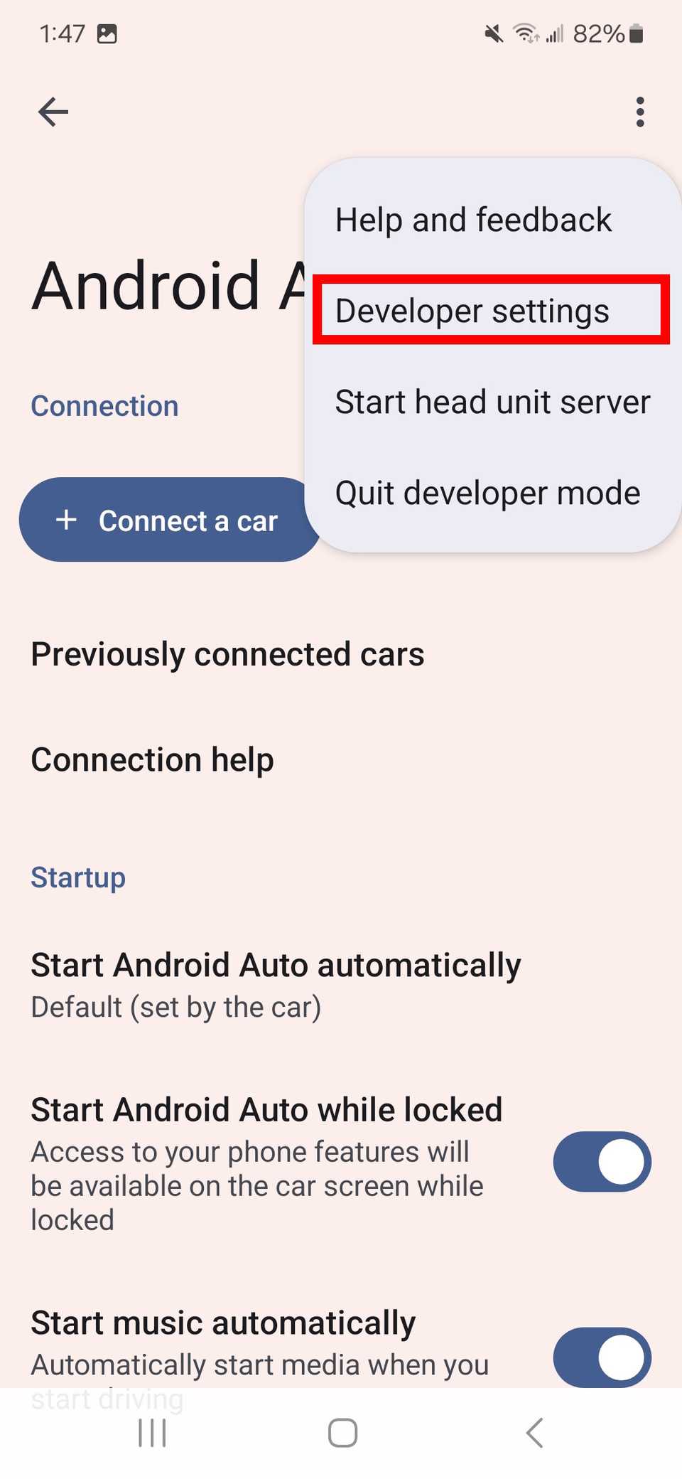مخطط مستطيل أحمر فوق إعدادات المطور في تطبيق Android Auto