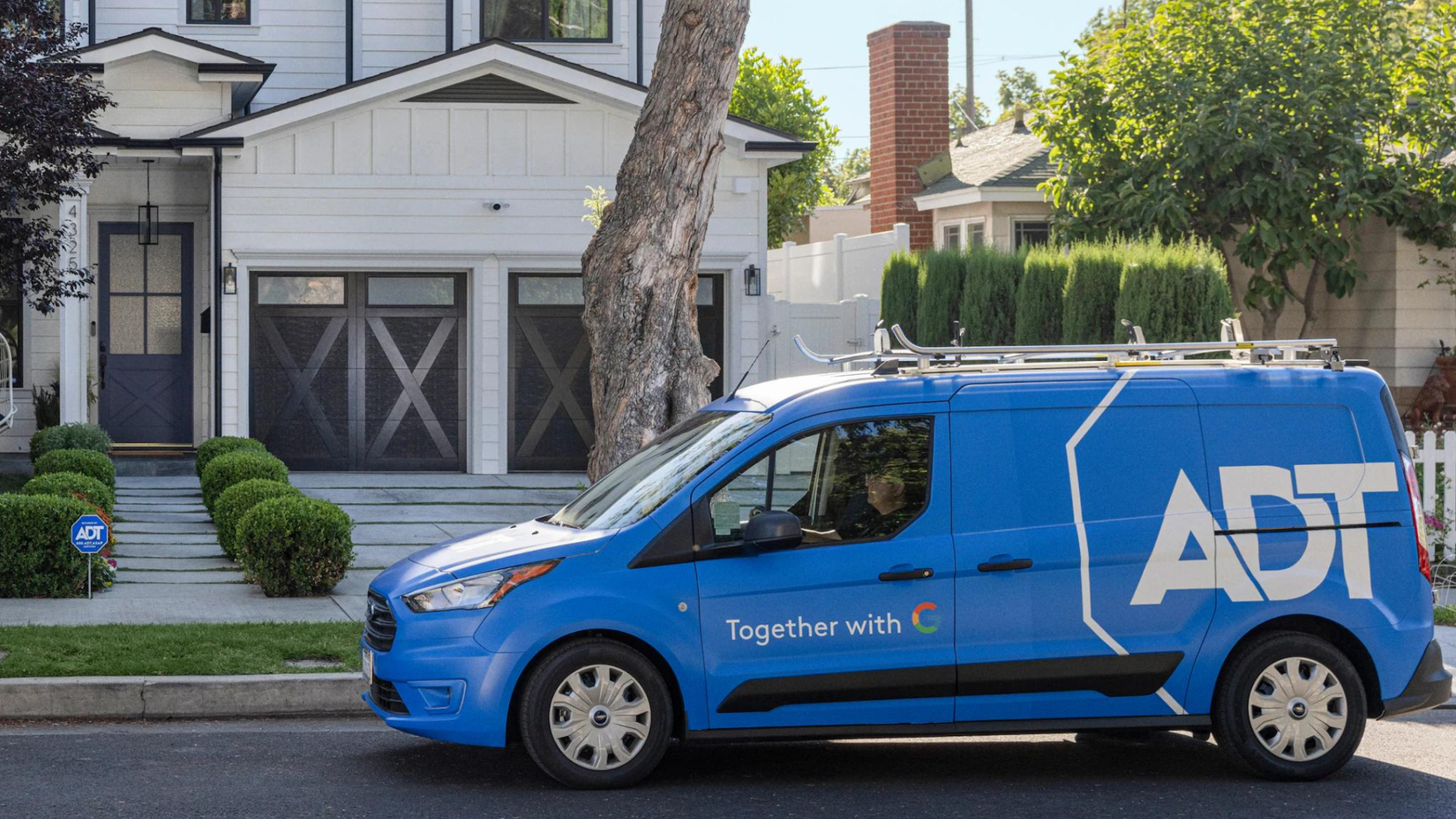 ADT van in front of home