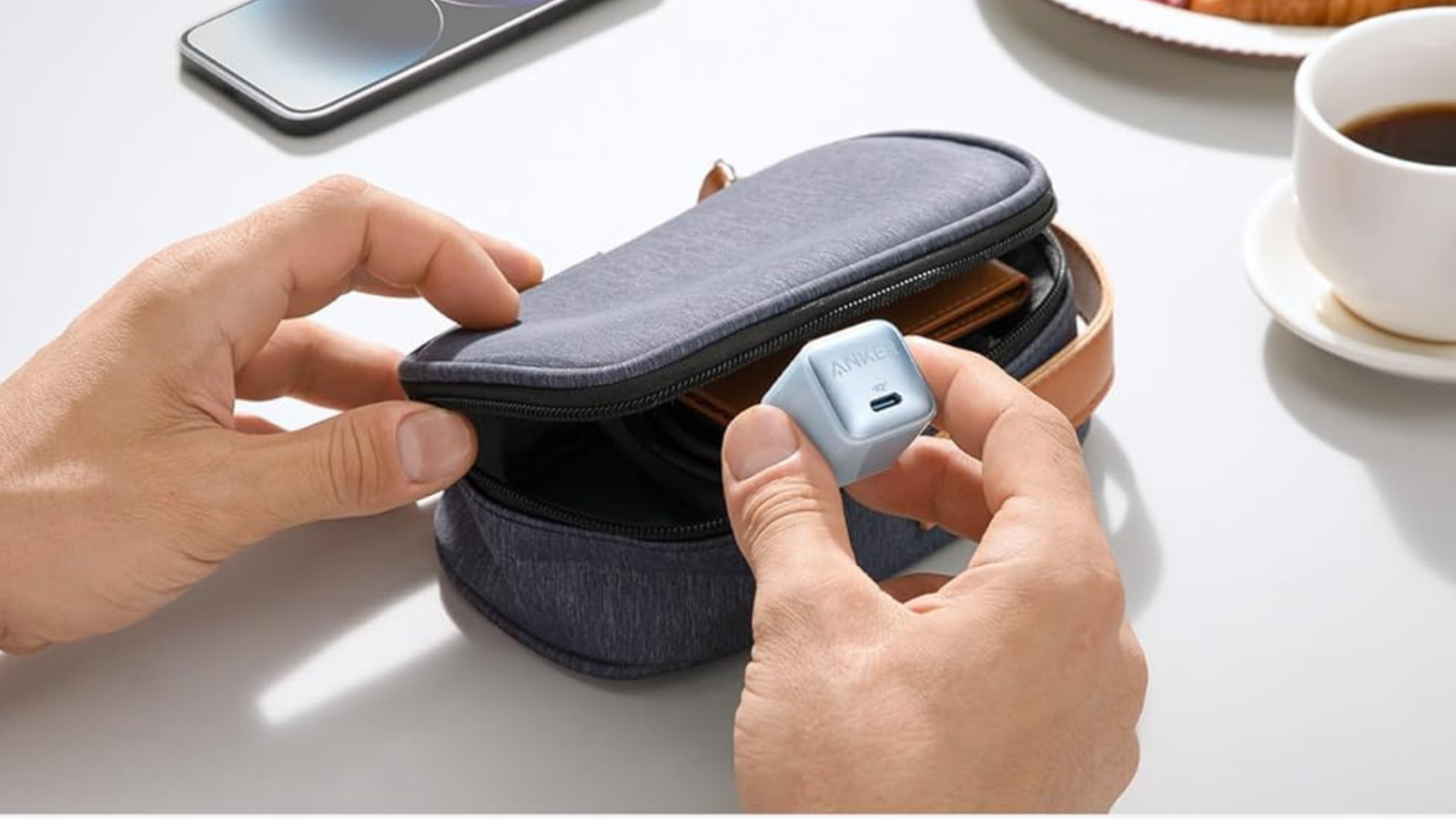 Anker 713 Charger (Nano II 45W) being placed in a case