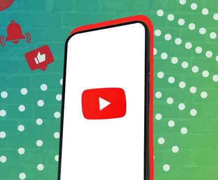 A phone showing the YouTube logo on a colorful background