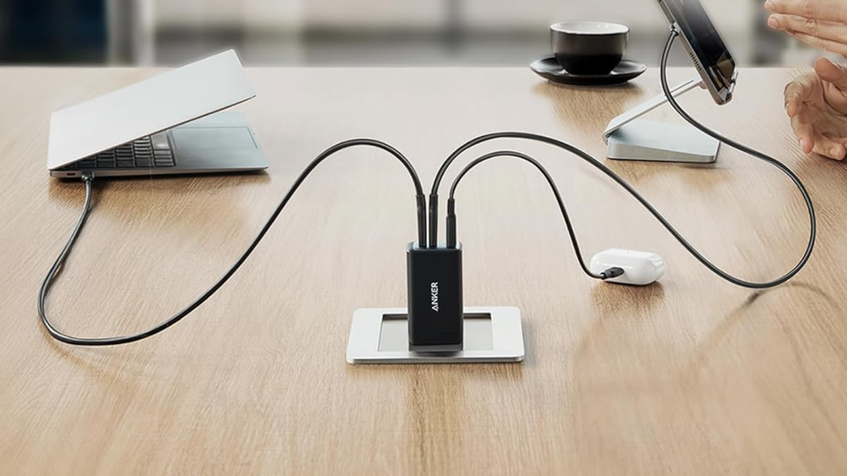 Anker 735 charger plugged into many devices