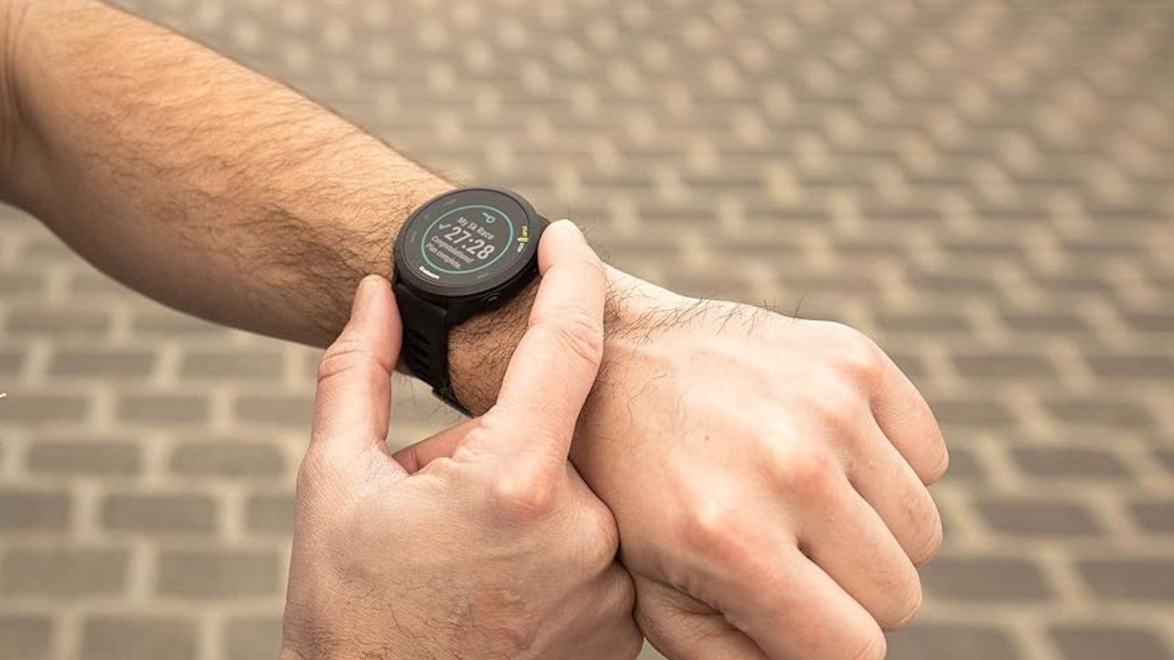 Garmin Forerunner 55 on person's wrist