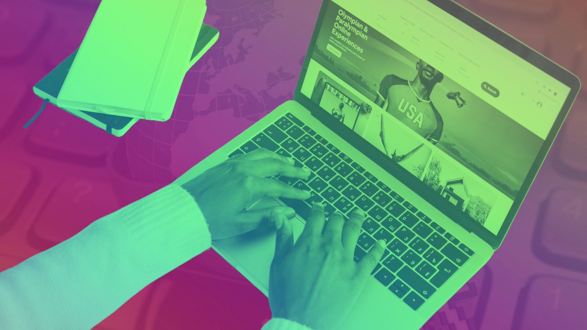 Hand typing on laptop keyboard with Chrome browser open