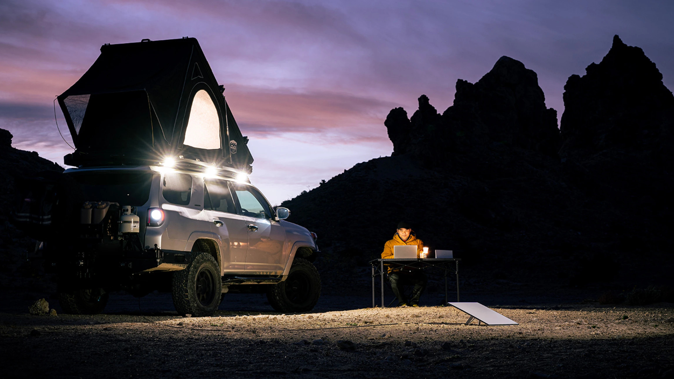 Person using Starlink Mini in the wilderness