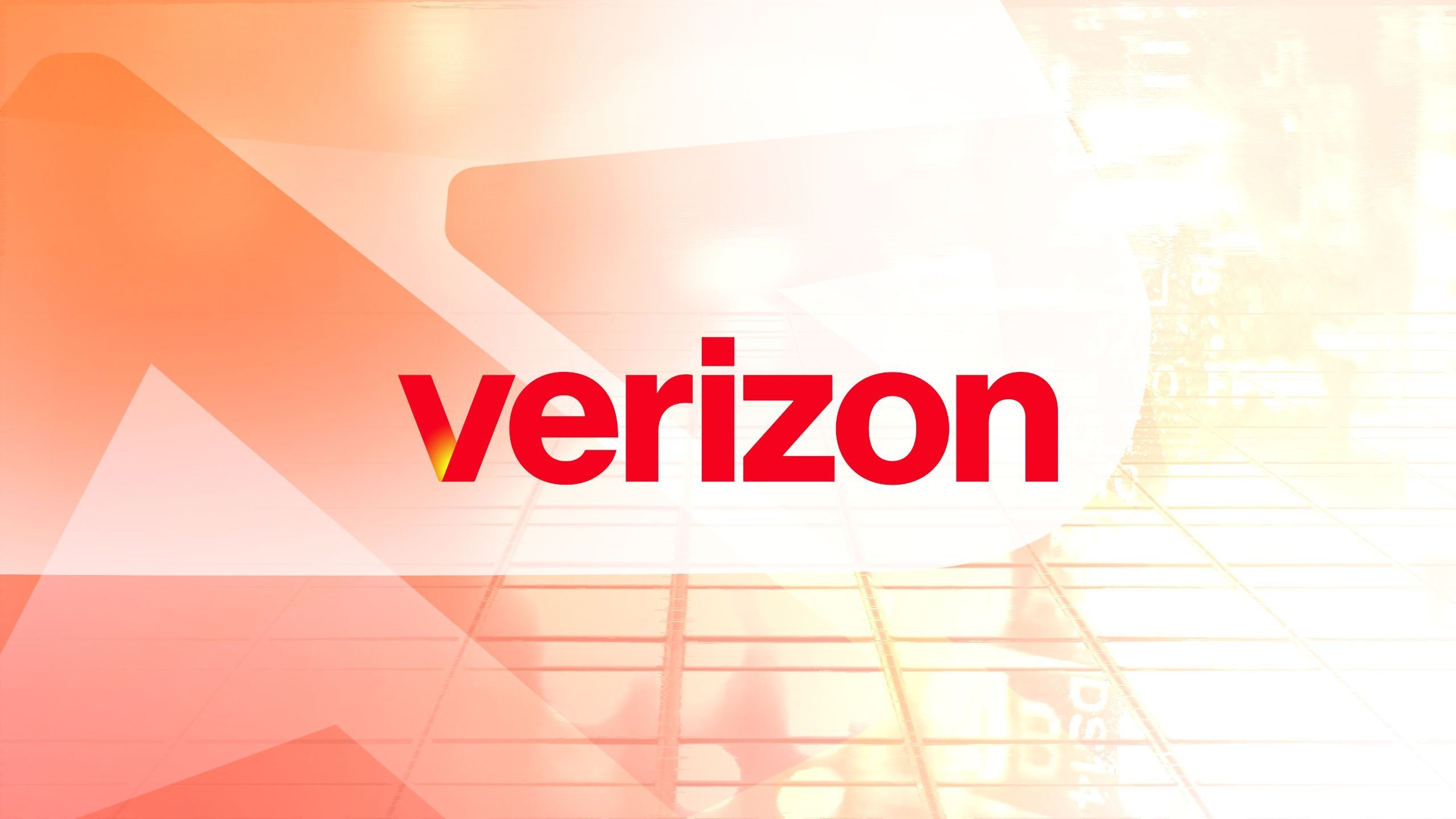 The Verizon logo against a faded orange and yellow background
