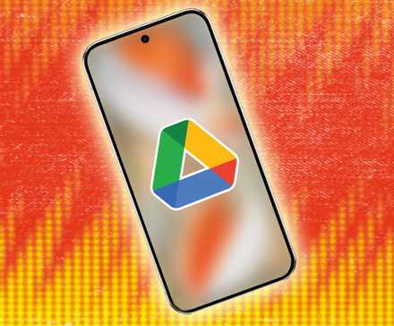 The Google Drive logo on a smartphone against a yellow and orange background