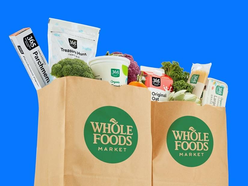 Dois sacos de supermercado da Whole Foods.