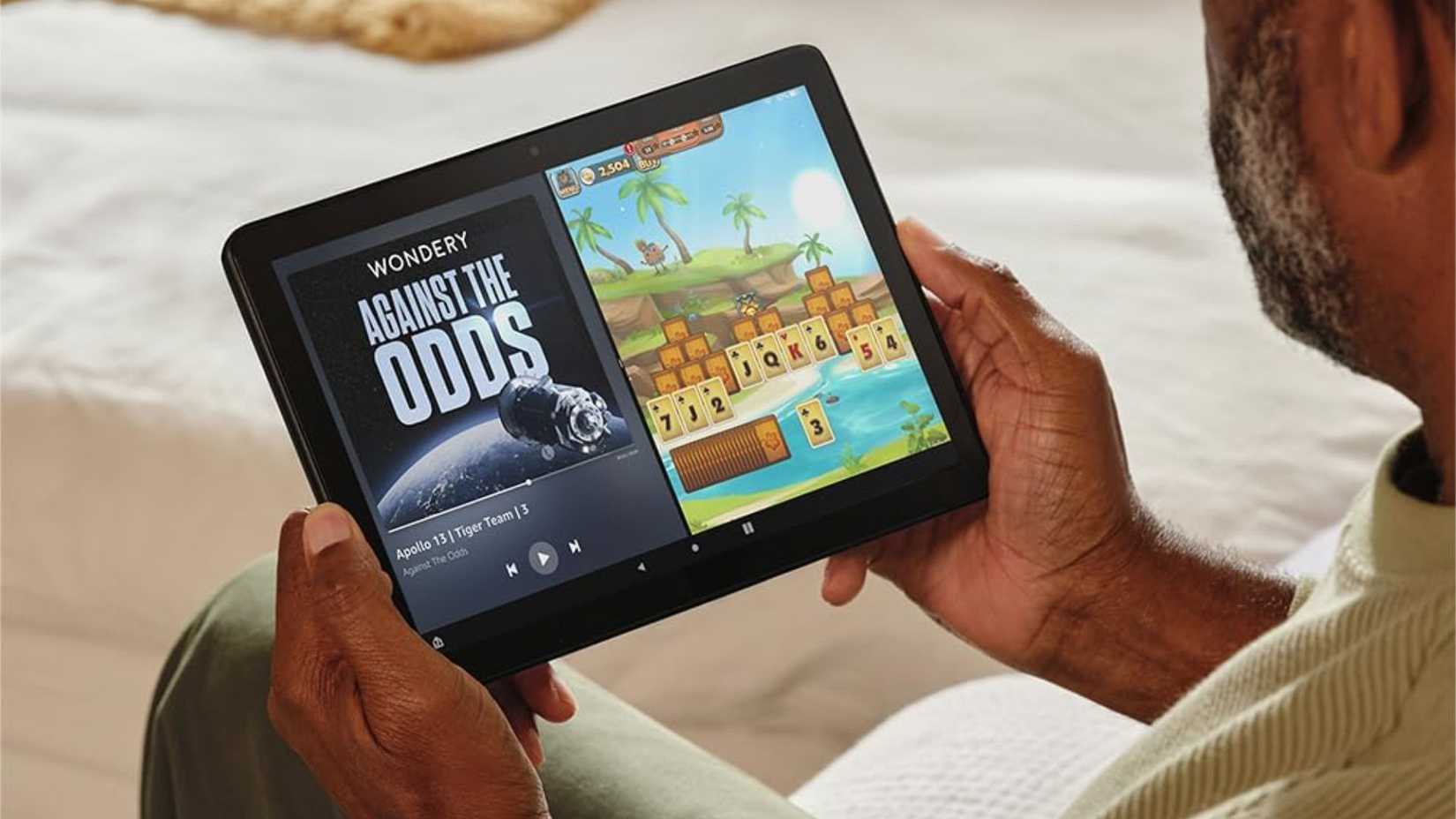 Looking at content on the Amazon Fire HD 10 tablet.