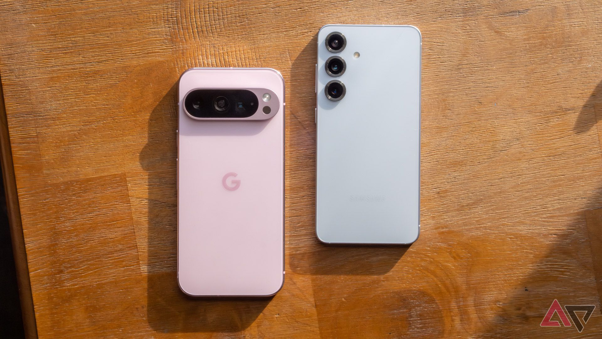 A samsungGalasy S25 smartphone next to a Google Pixel 9 Pro