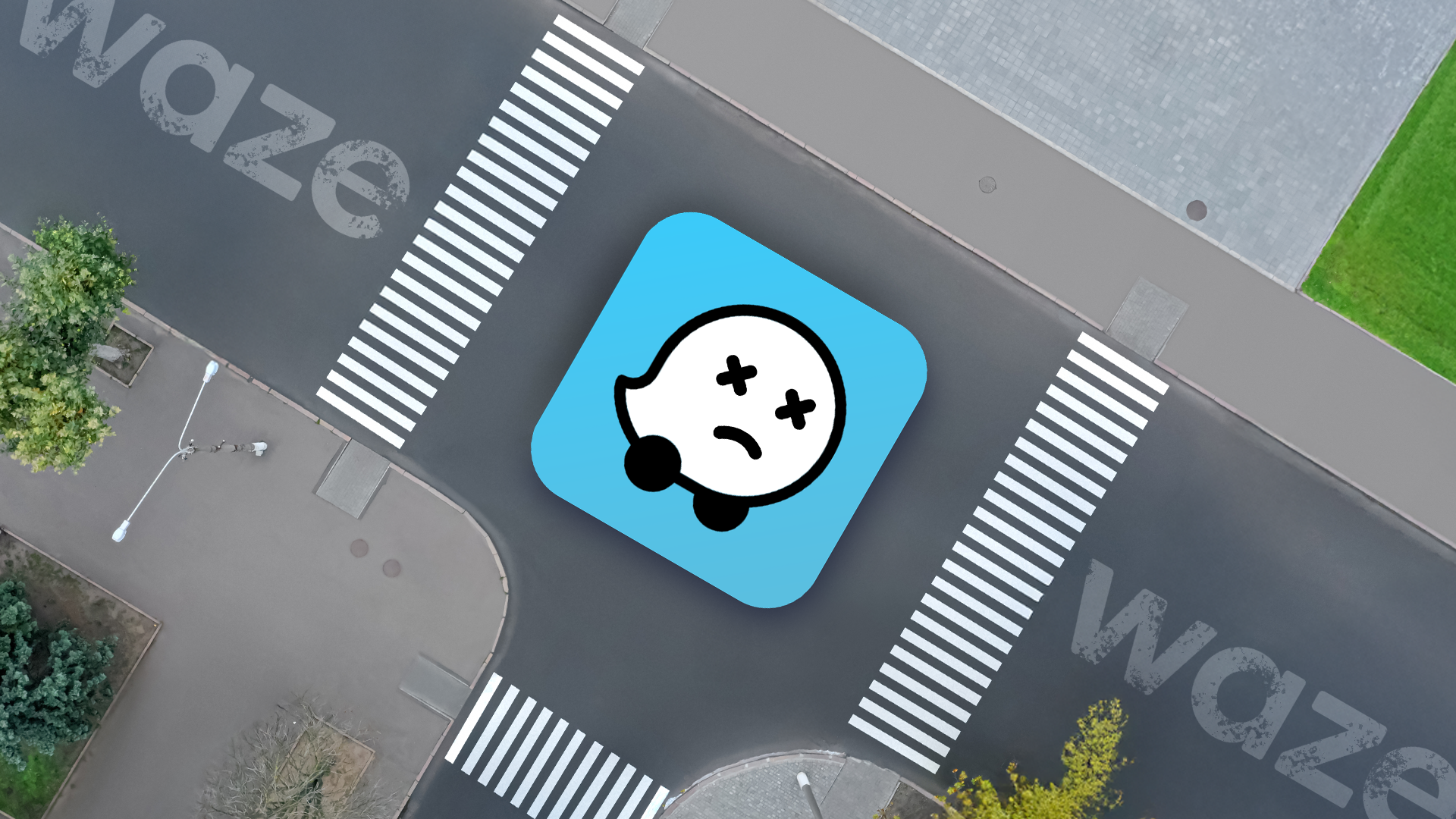 Una strada vista dall'alto con il logo Waze che mostra un'espressione morta.