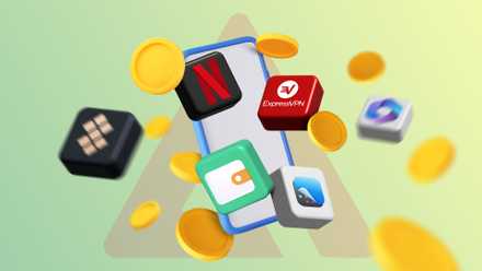 Uno smartphone circondato dalle icone e dalle monete delle app a pagamento preferite