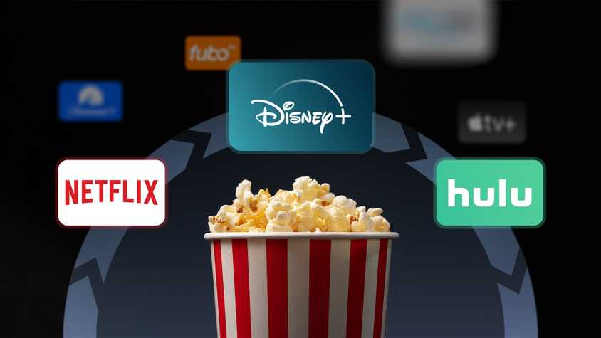 A popcorn bucket with several streaming service logos around it.