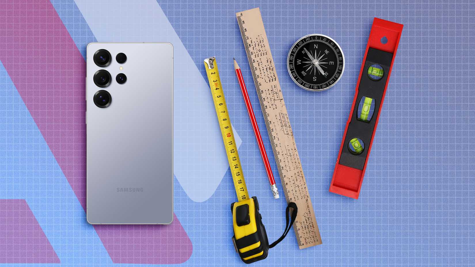 A smartphone placed beside some tools on a tool bench.