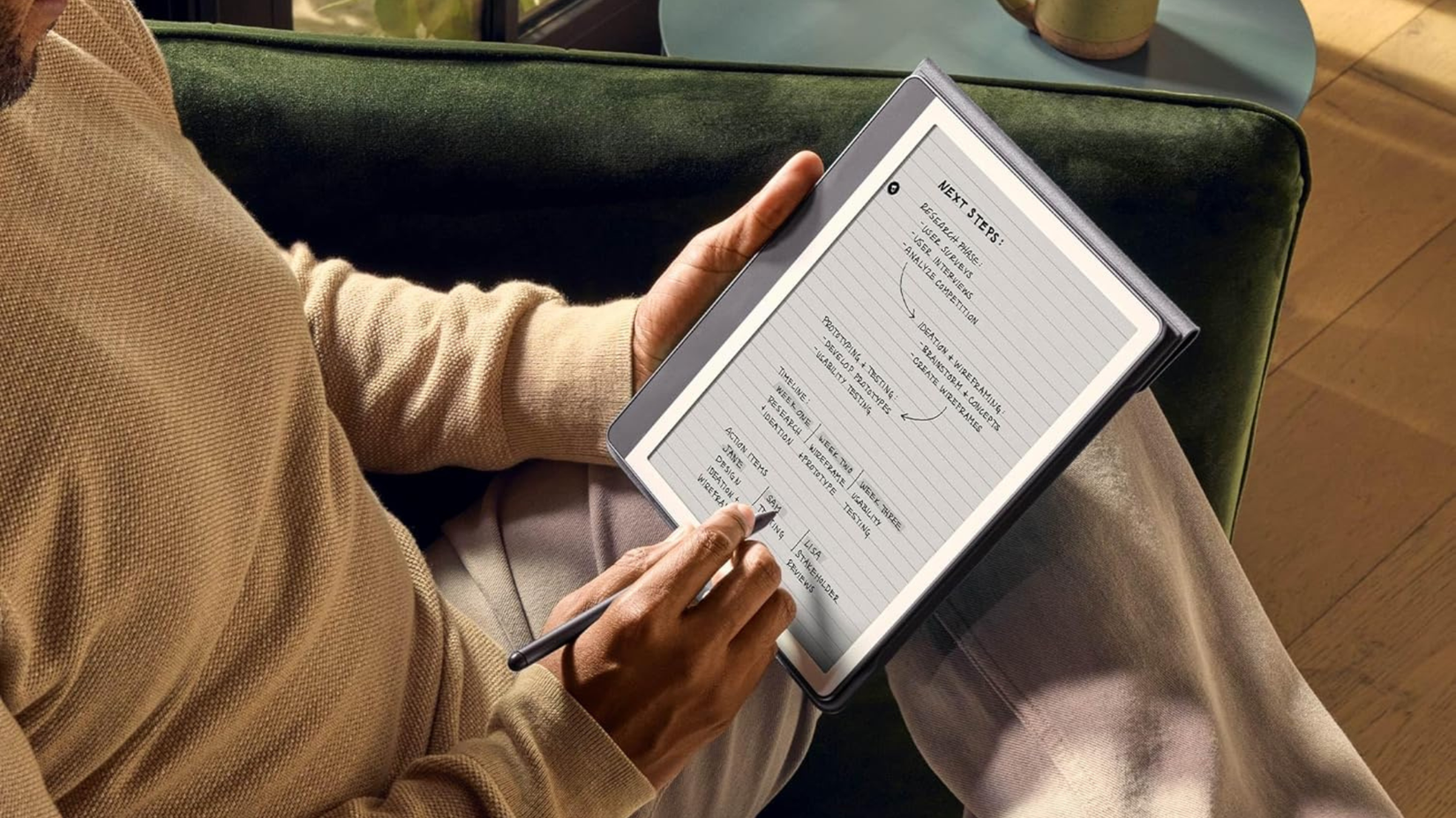 Person using Amazon Kindle Scribe 