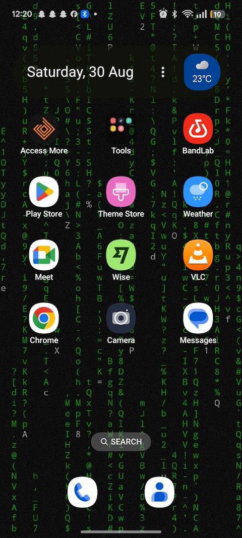 Android Home Screen showing matrix code rain screenshotted from Termux app used as wallpaper