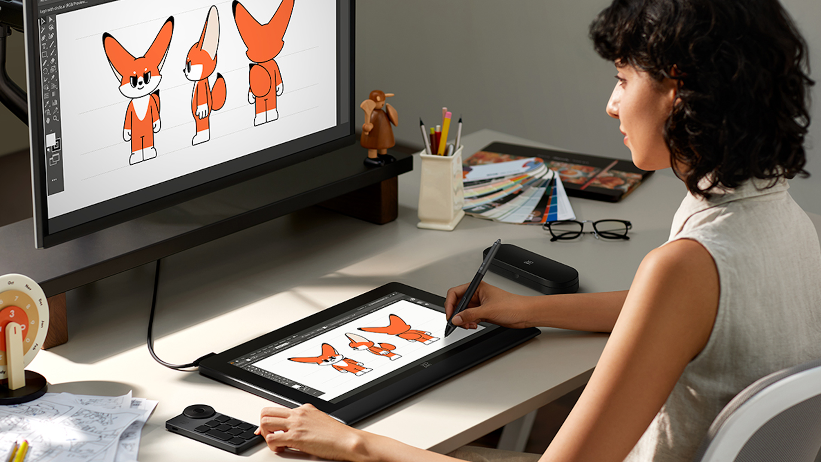 A woman designing a cartoon fox with the XPPen Artist Ultra 16