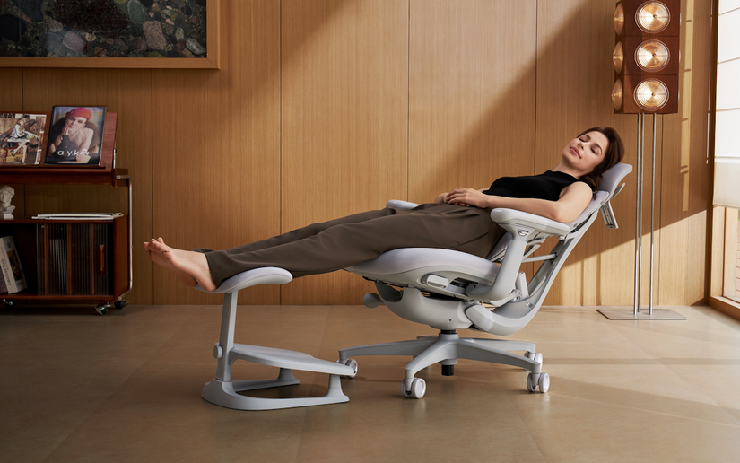 A woman reclining on the LiberNovo Omni
