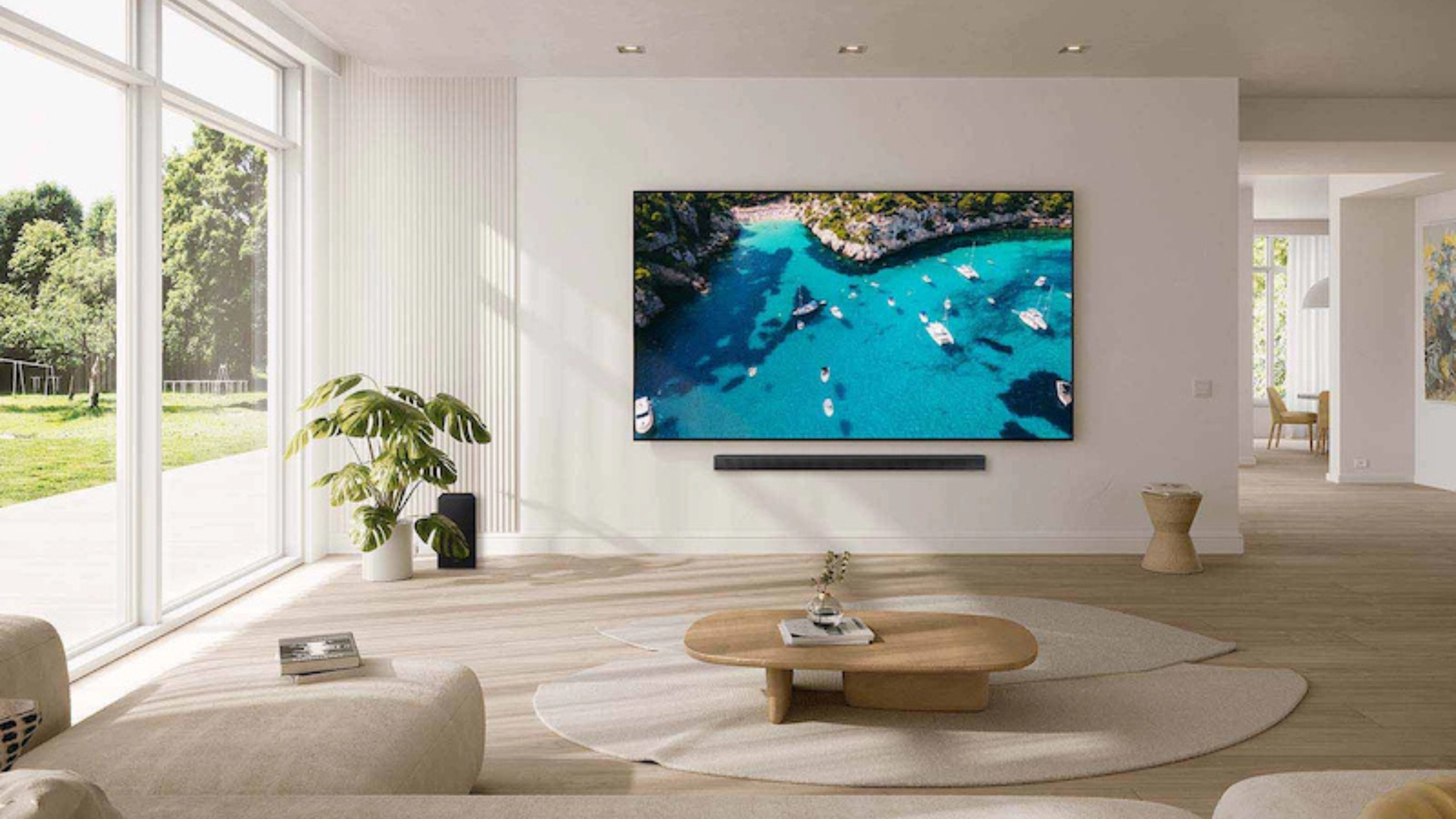 Samsung Crystal UHD DU9000 Series HDR Smart TV mounted to wall in living room