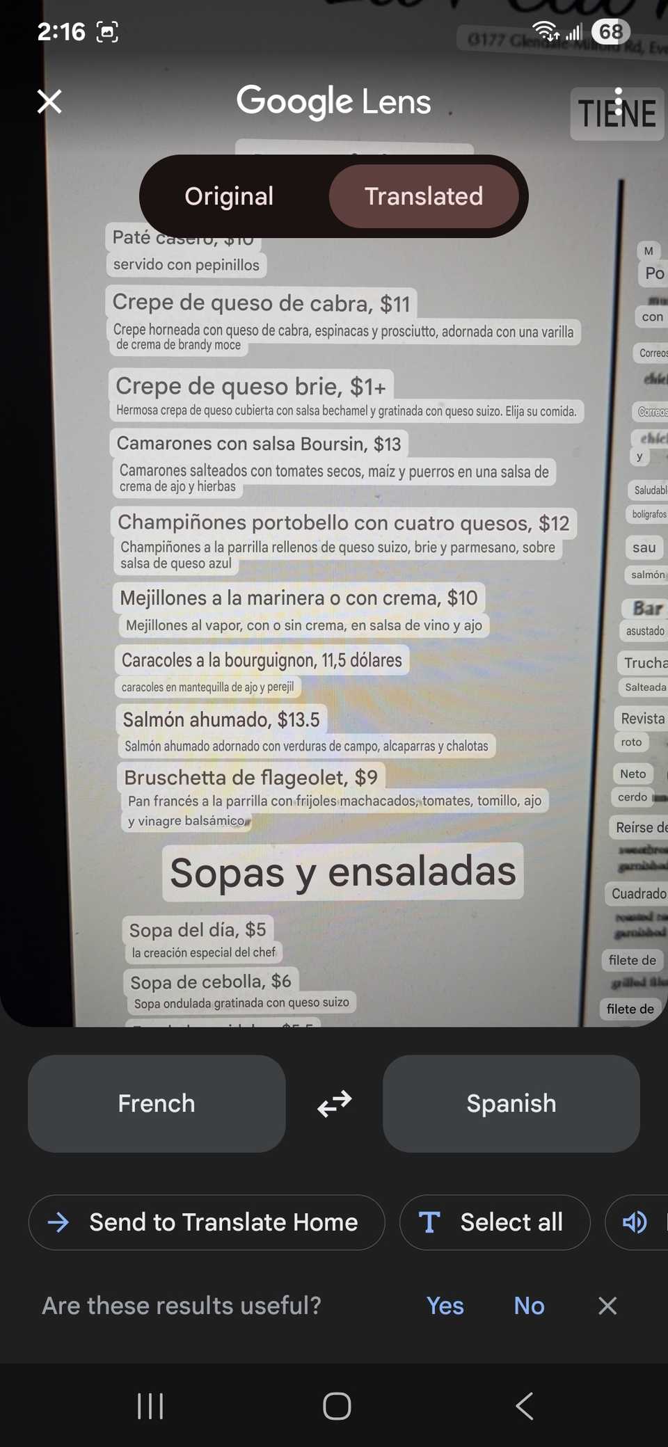 Translated text displayed in your phone's camera with Google Lens and Google Translate including options at the bottom to change the language and options to send to Translate Home and Select all