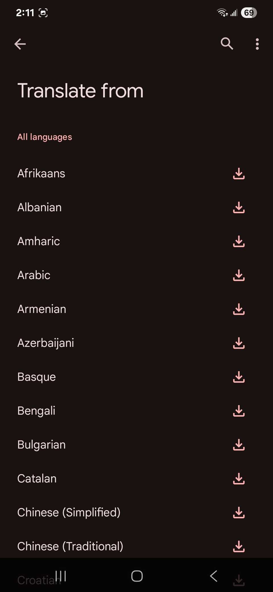 Choosing a language to translate from in the Google translate app showing a list of available languages and the download button next to each language label
