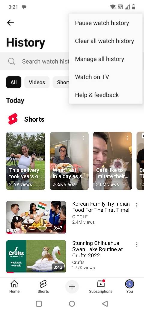 Screenshot showing the Pause watch history option in the YouTube app