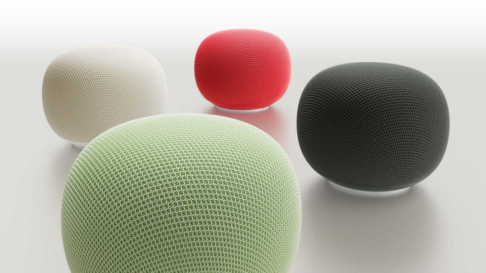 four google home speakers in different colors