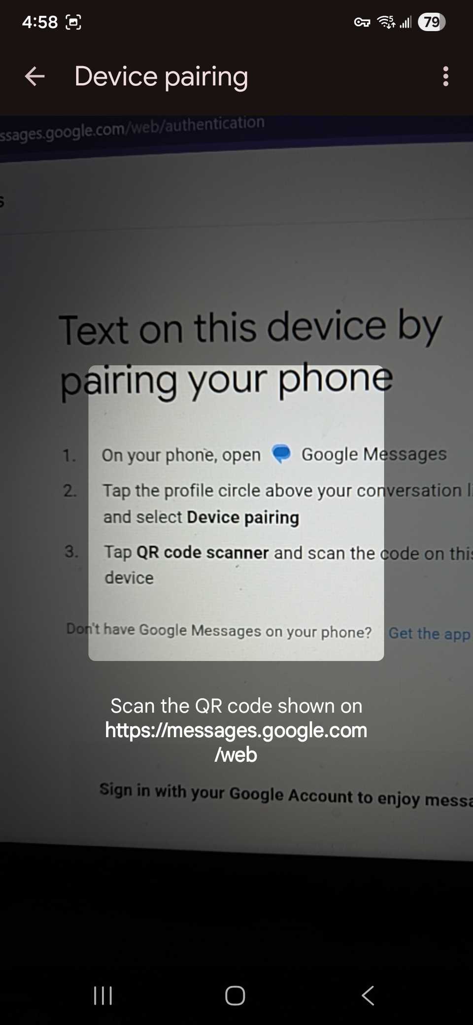 Using the built-in QR code scanner in the Google Messages app to point to a computer screen with QR code and instructions