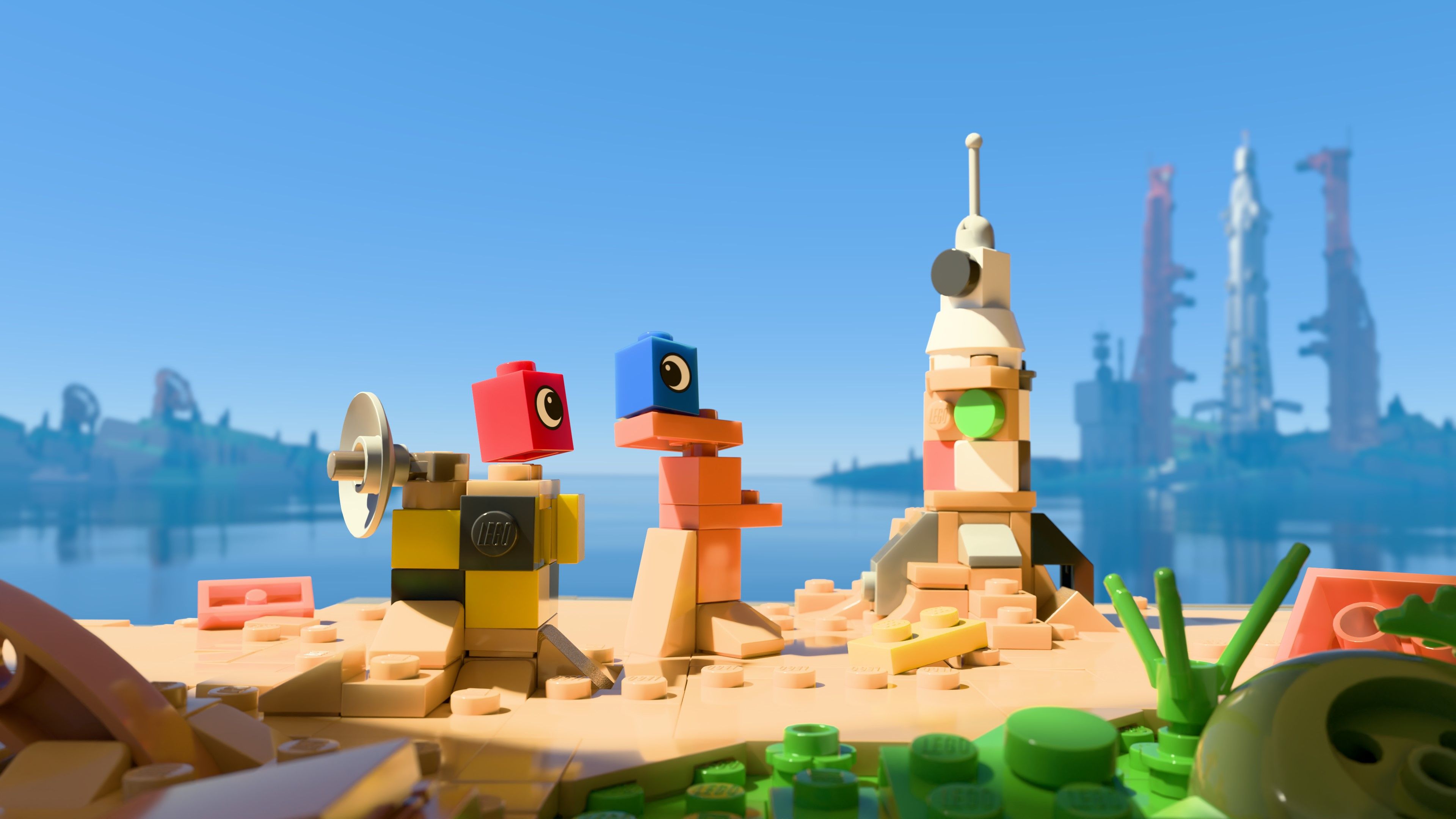 Two lego bricks sit on a beach in key art for Lego Voyagers