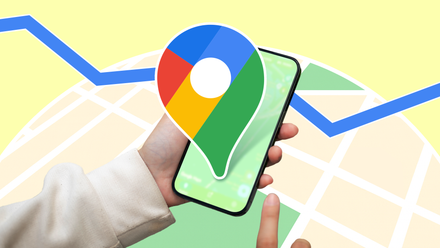 I have used Google Maps for a decade, however those 7 options nonetheless shocked me A person holding a smartphone with the Google Maps logo enlarged over the screen, set against a stylized map background with a blue navigation route line running across it.