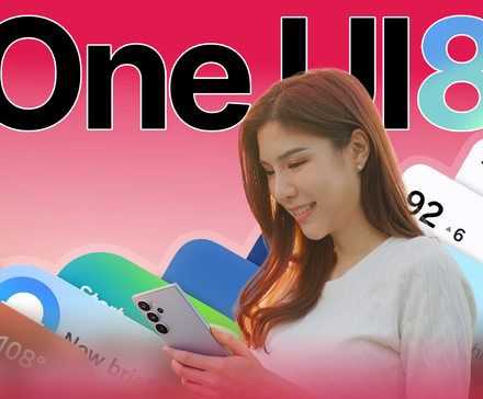 A woman smiling while using a Samsung Galaxy smartphone, with colorful One UI 8 interface cards in the background.