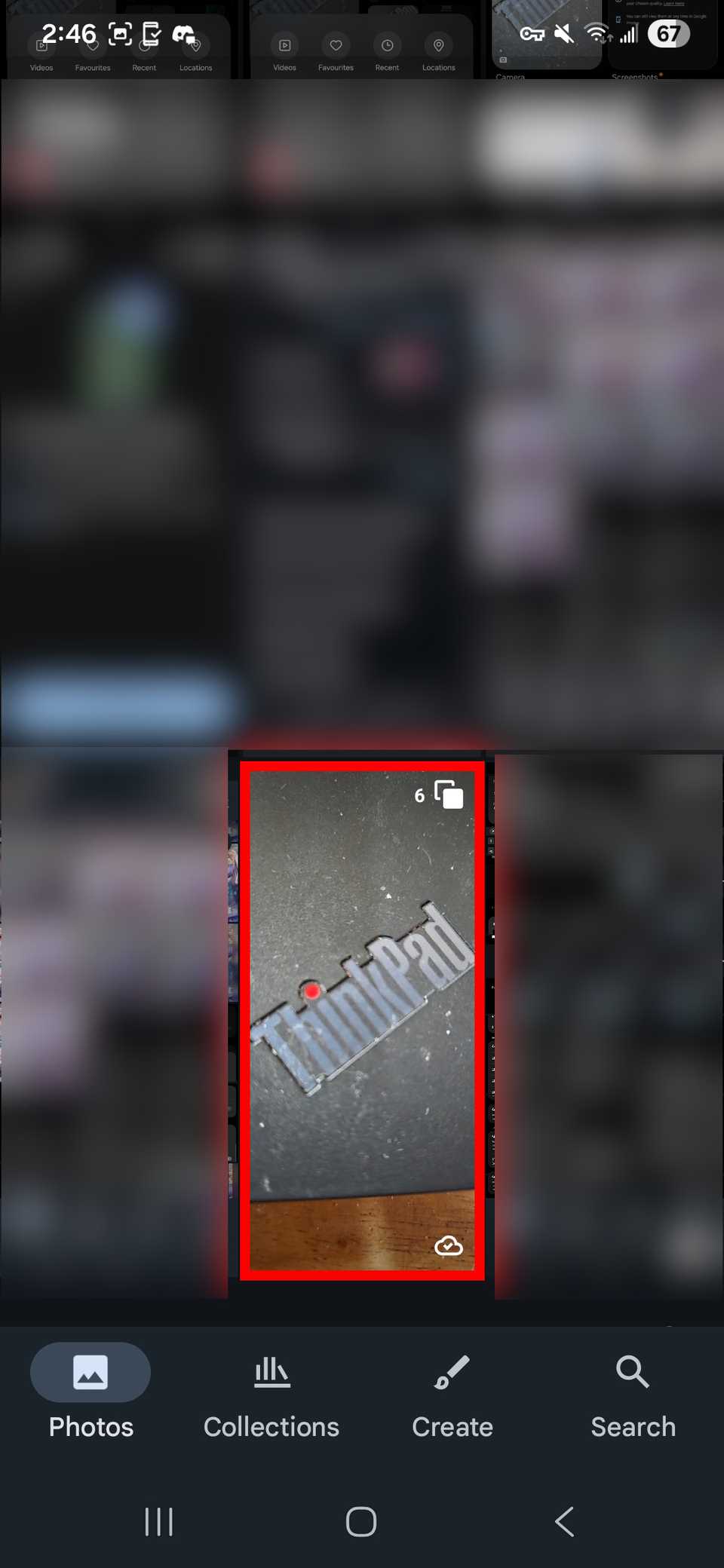 Red rectangle selecting a photo stacks in Google Photos app