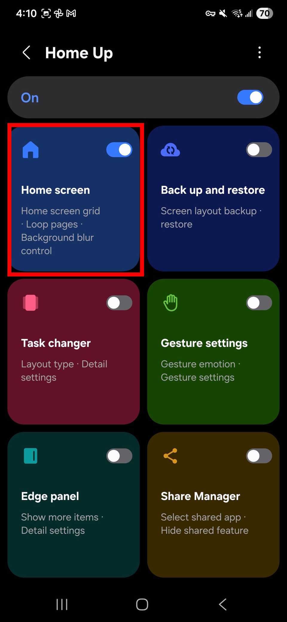 مخطط مستطيل أحمر يبرز شبكة الشاشة الرئيسية في وحدة Home Up