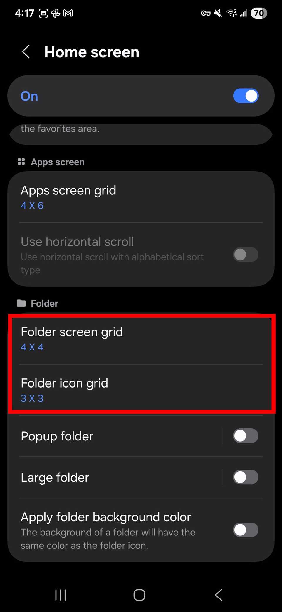 مخطط باللون الأحمر يبرز شبكة شاشة المجلد وحجم شبكة أيقونة المجلد في إعدادات المجلد في إعدادات الشاشة الرئيسية أثناء وجودك في وحدة Home Up