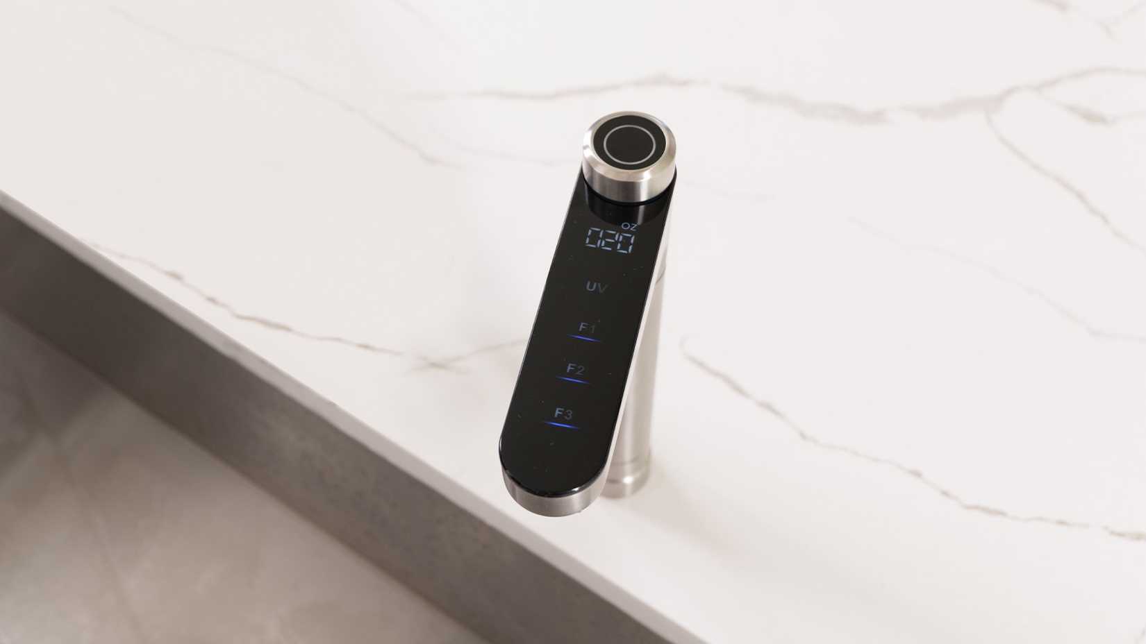 waterdrop x12 faucet on a stone countertop