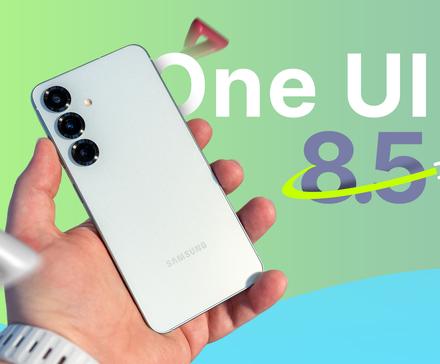 A hand holding a Samsung Galaxy s25, with 'One UI 8.5' displayed beside it.