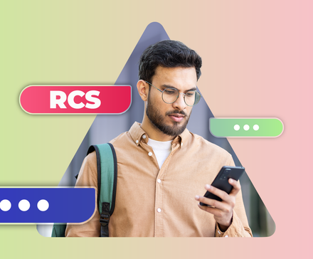 A man looks at his phone while colorful chat bubbles surround him, including one labeled 'RCS'.