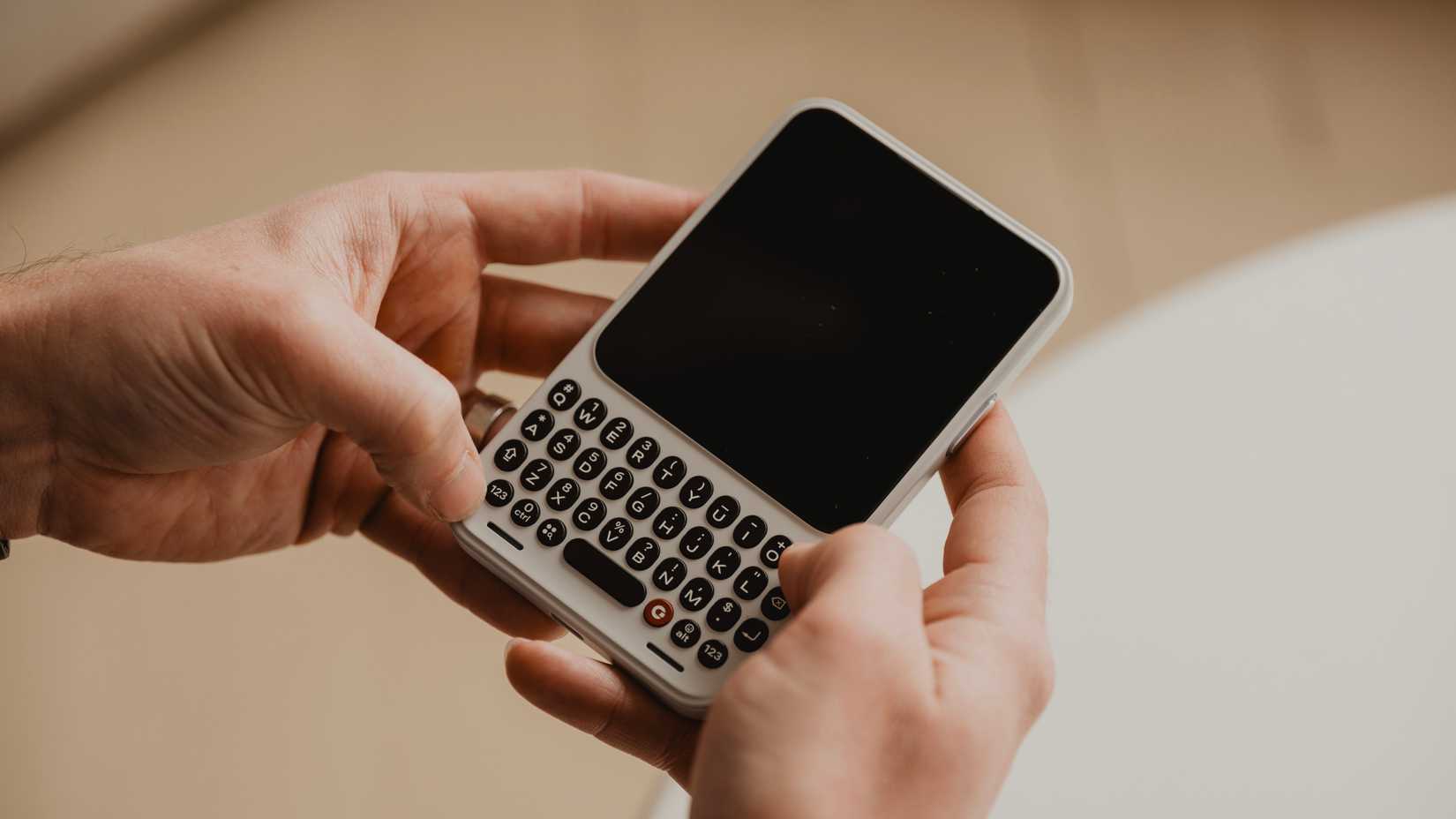 clicks-communicator-hand